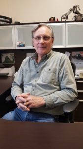 Ross Trawin sitting in his office at Trawin Seeds